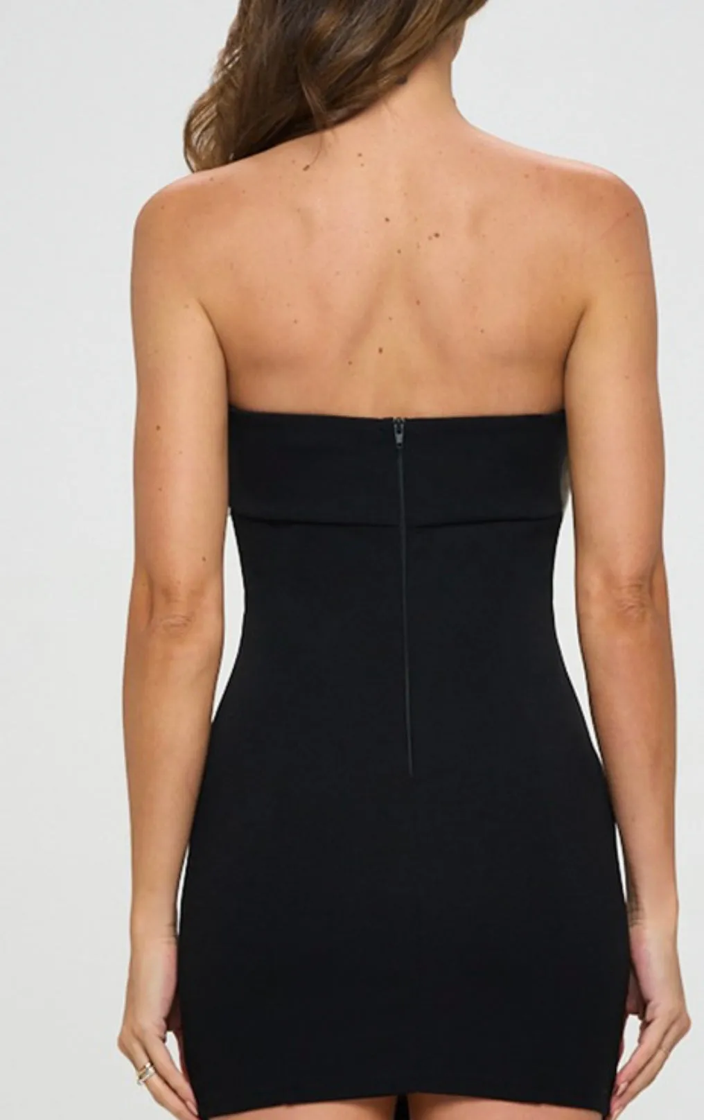 Strapless black mini dress with white Bow