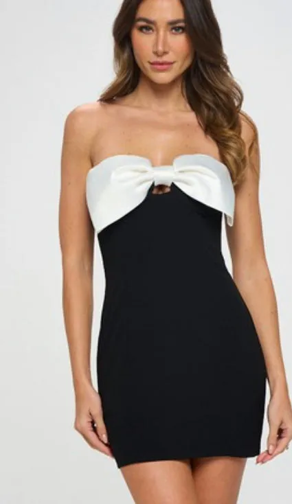 Strapless black mini dress with white Bow