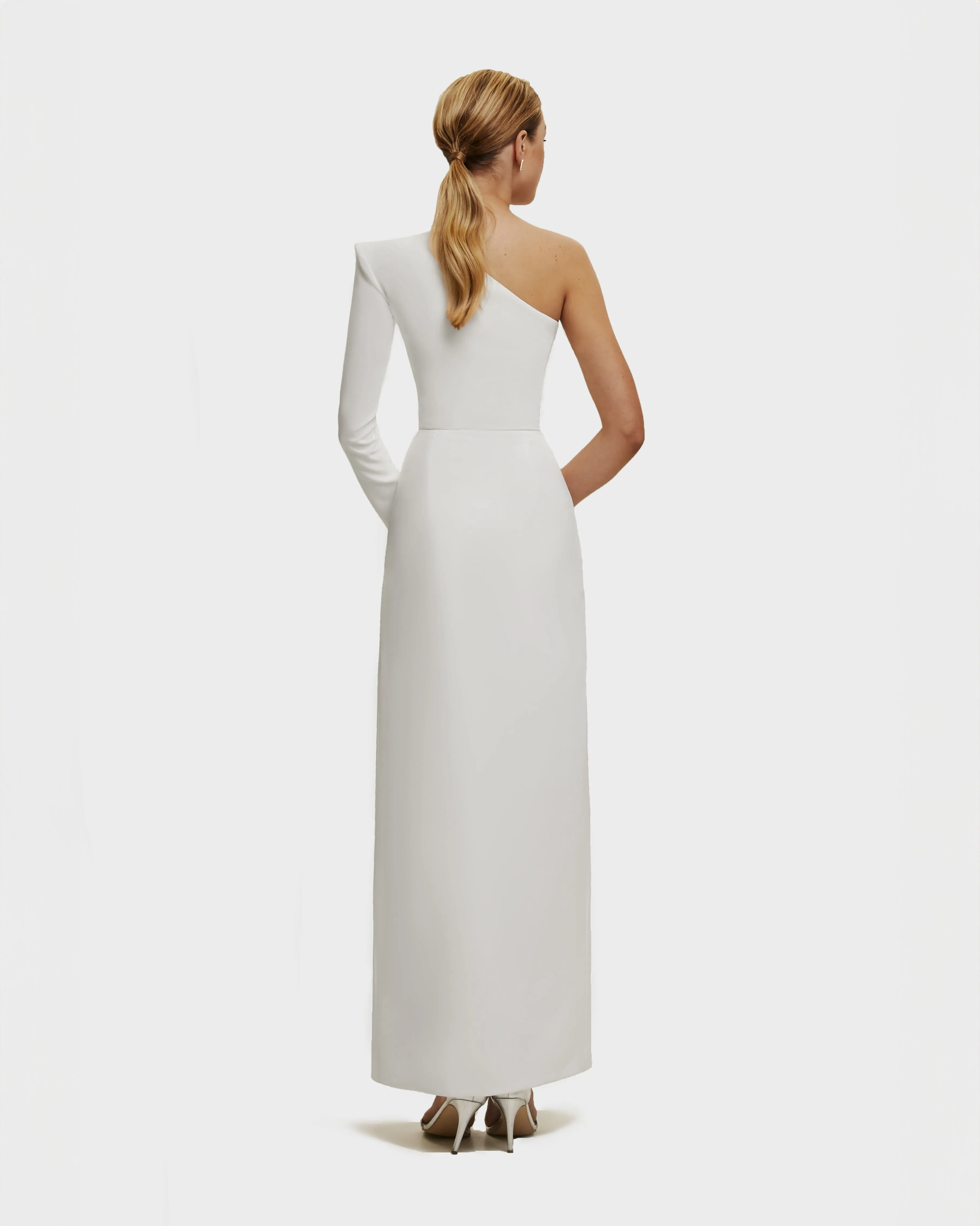 White Long-sleeved dress with sharp shoulder cut